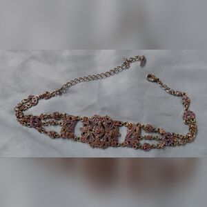 Elegant Gold and Purple Bracelet